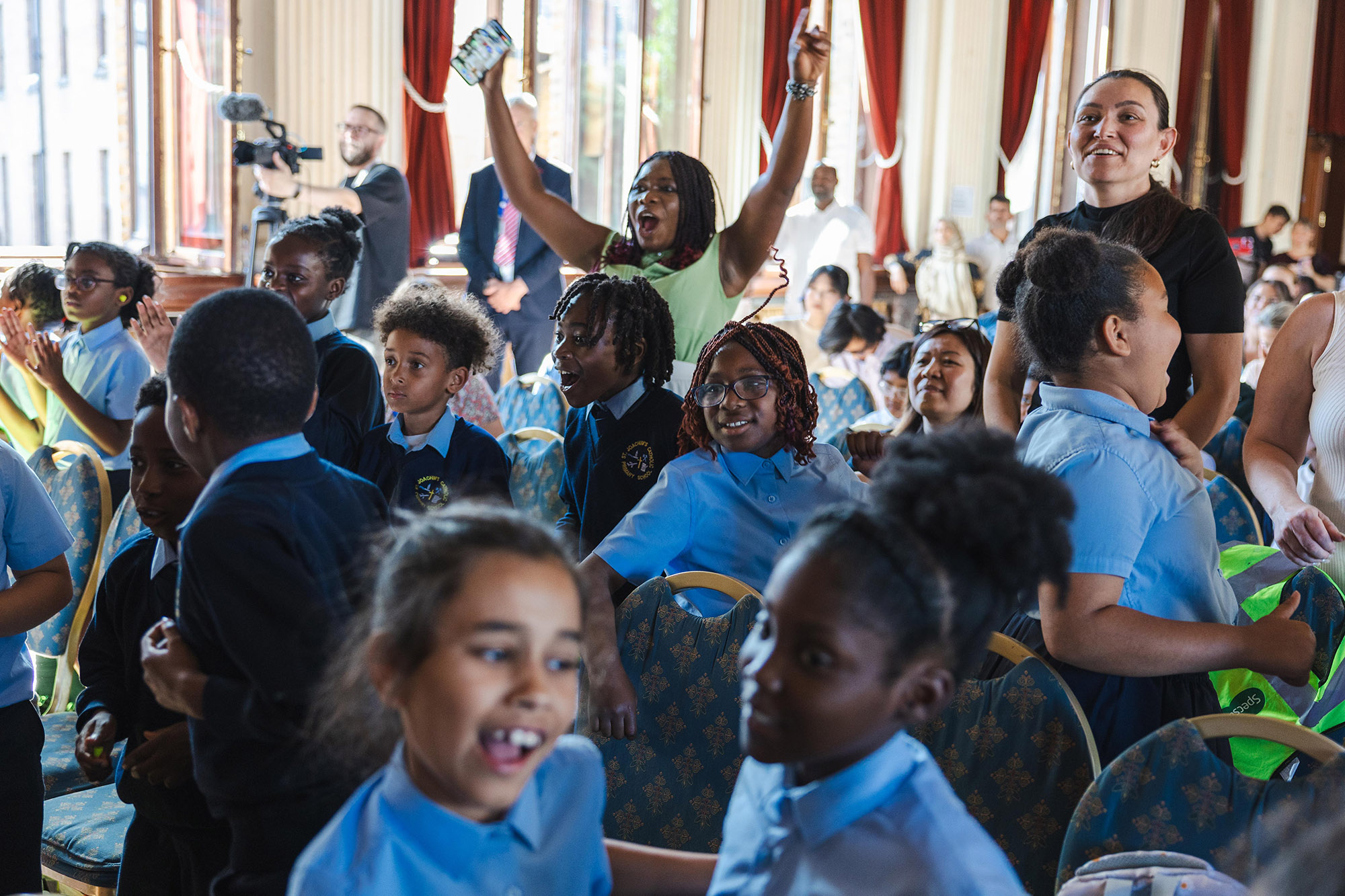 Image of crowd of teachers and students dancing